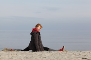 60321631 - young fitness girl a the beach in winter