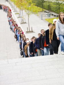 Large group of people waiting in line