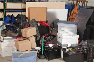 Pile of boxes junk inside a residential garage