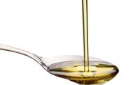 Olive Oil pouring over a spoon