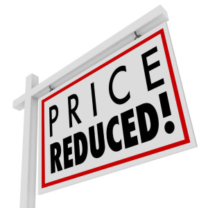 Price Reduced words on a home for sale sign