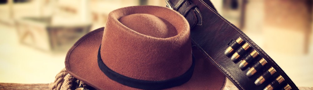 Western accessories on wooden table