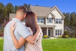 Affectionate Military Couple Looking at Nice New House