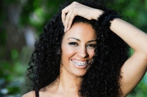 Portrait of a happy black girl with braces