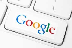 Keyboard with Google logotype, printed on paper and placed on button. Google is USA multinational corporation specializing in Internet-related services and products.