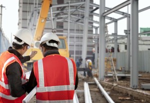 two foreman discussion on construction site