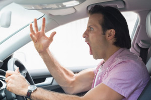 38145736 - man having road rage in his car