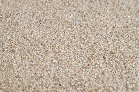 Sand texture background in macro, big closeup with deatals, focus in the middle of the picture