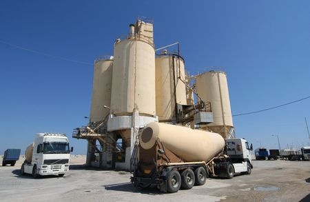 ement factory with silos and trucks