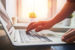 52328754 - business woman working at office with laptop