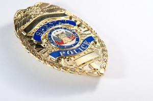 12007085 - a shallow depth of field look of a generic looking police badge