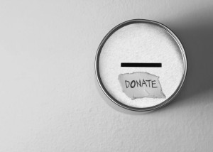 16768027 - donate box over gray background