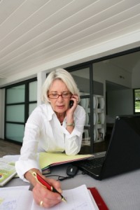 13852443 - senior businesswoman working at home