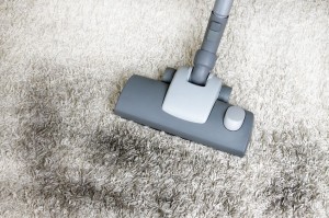 13739991 - vacuuming very dirty white carpet