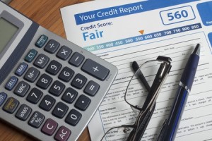 42604528 - credit report with score on a desk