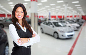 47710075 - car dealer woman. auto dealership and rental concept background.