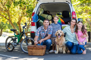 42672054 - happy family getting ready for road trip on a sunny day