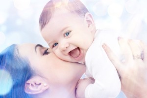 15452158 - picture of happy mother with baby in hands