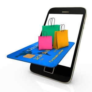 18703014 - smartphone with credit card and colorful shopping bags