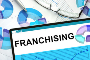 38737550 - franchising  on tablet with graphs.