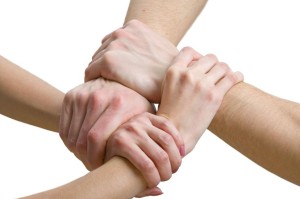 4776239 - four hands touching each other, close-up