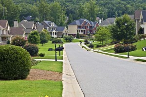 10282049 - a street on a quiet day in a suburban neighborhood.