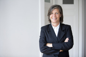 30974116 - portrait of a businesswoman in a suit and smiling