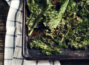 39528470 - crispy cheese and chili kale chips on baking tray