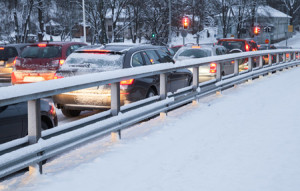 51570856 - cars in a traffic jam on winter street in finland
