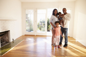 71272241 - portrait of family in new home on moving day