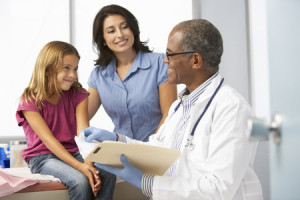 42257703 - doctor in surgery examining young girl