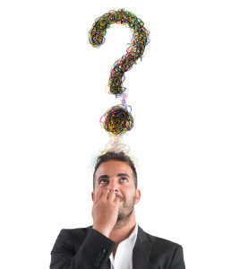 64803594 - businessman with big question mark over head