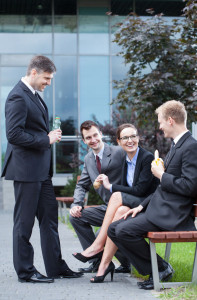 30476724 - group of young employees having lunch outdoors