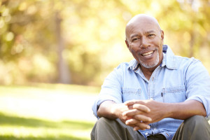 31053823 - senior man relaxing in autumn landscape