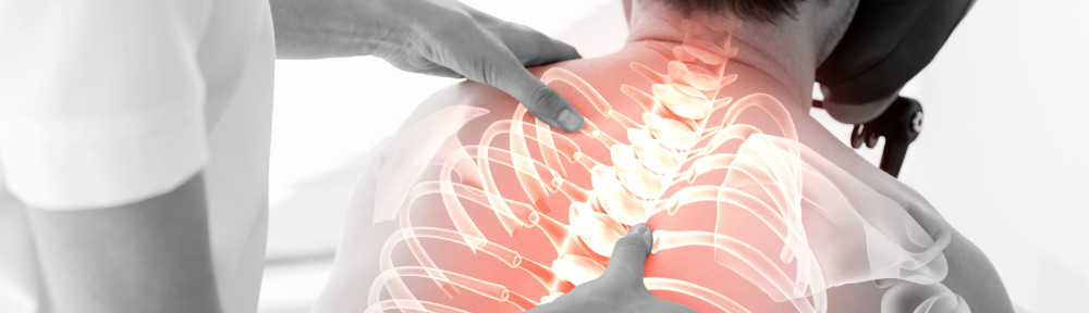 40311926 - digital composite of highlighted spine of man at physiotherapy
