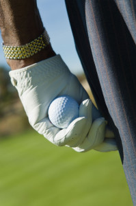 5435775 - golfer holding golf ball