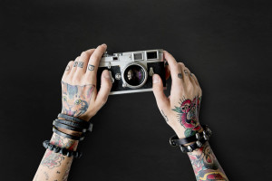 69435307 - tattoo camera photography media creative film concept