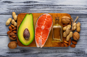 53059744 - healthy fat salmon, avocado, oil, nuts. selective focus
