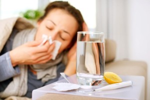 16311394 - sick woman  flu  woman caught cold  sneezing into tissue