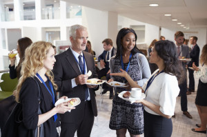 71258997 - delegates networking during conference lunch break