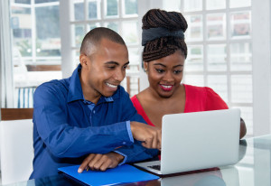 105799276 - african american couple at computer