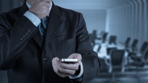 20101152 - businessman hand use smart phone computer as concept