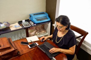 78222731 - hispanic woman working from home