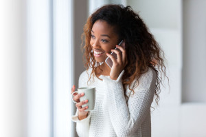 36918488 - african american woman talking on a mobile phone - black people