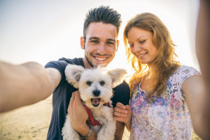 Happy couple with dog