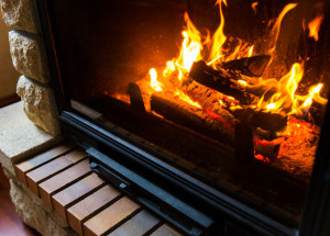 close up of burning fireplace at home inspection