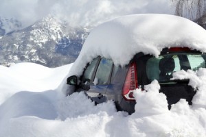 20322136 - car burried under snow in alps
