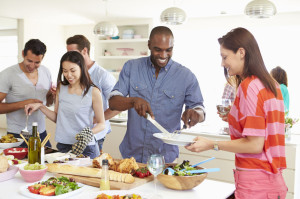 Group Of Friends Having Dinner Party At Home