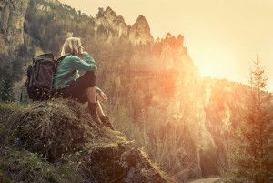 56530398 - woman hiking around mountains at spreeng time.