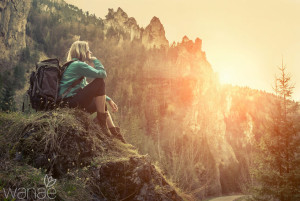 56530398 - woman hiking around mountains at spreeng time.